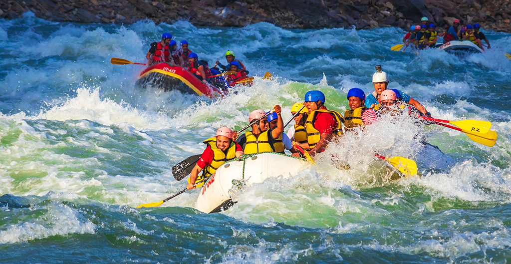 People enjoying white water rafting.